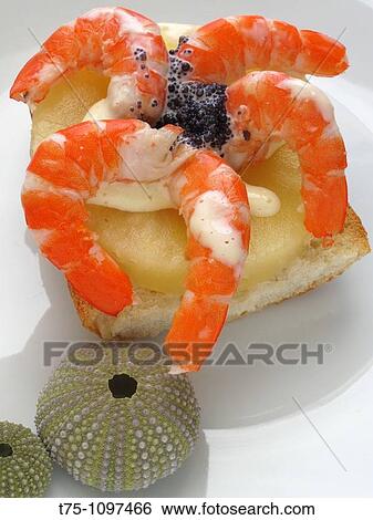 Stock Photograph - Toasted bread, fresh pineapple and prawns with mayonnaise. Fotosearch