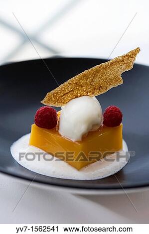 Stock Image - ? Tocinillo de Cielo? on yogurt foam and baked apple ice cream Corua, La Corua, Galicia, Spain, Europe. Fotosearch