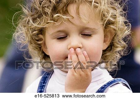 Toddler blowing kiss View Large Photo Image Stock Image - Toddler blowing kiss. Fotosearch