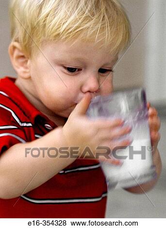Stock Photo - toddler drinking milk. Fotosearch