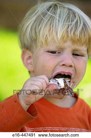 toddler eating ice cream View Large Photo Image Stock Image - toddler eating ice cream. Fotosearch
