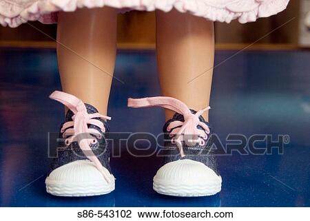 Toddler girl sneaker shoes on a store window mannequin View Large Photo Image Stock Image - Toddler girl sneaker shoes on a store window mannequin. Fotosearch