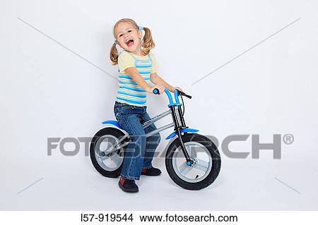 toddler, little girl, riding bicycle, like a bike, white background, studio, Switzerland View Large Photo Image Picture - toddler, little girl, riding bicycle, like a bike, white background, studio, Switzerland. Fotosearch