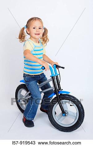 toddler, little girl, riding bicycle, like a bike, white background, studio, Switzerland View Large Photo Image Stock Image - toddler, little girl, riding bicycle, like a bike, white background, studio, Switzerland. Fotosearch