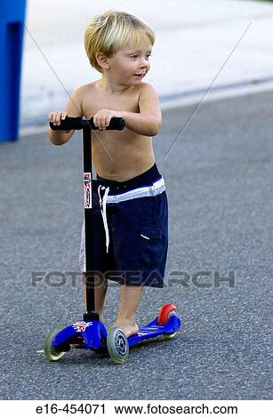 toddler on scooter View Large Photo Image Stock Image - toddler on scooter. Fotosearch