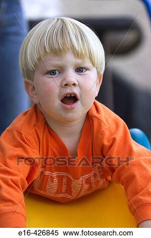 Toddler on slide with mouth open. View Large Photo Image Stock Photography - Toddler on slide with mouth open.. Fotosearch