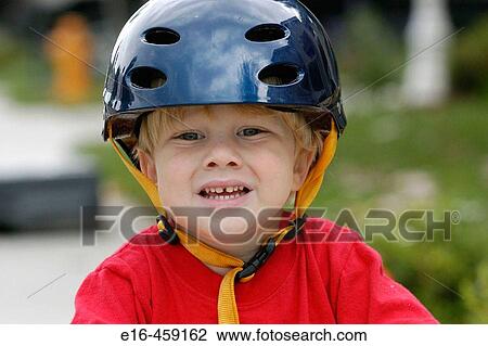 Toddler wearing bike helmet View Large Photo Image Stock Image - Toddler wearing bike helmet. Fotosearch