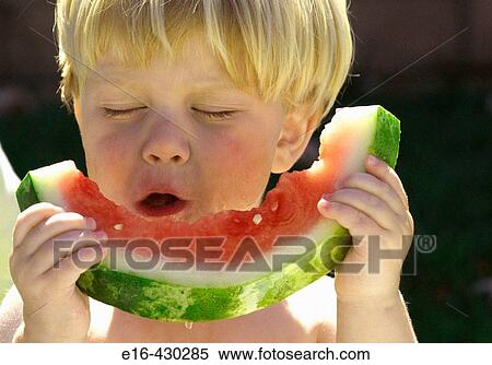 Toddler with watermelon View Large Photo Image Stock Photography - Toddler with watermelon. Fotosearch