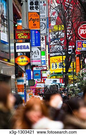 Tokyo, a city with over 12 million people is one of the most vibrant in the world. Every corner reveals creative design and color throughout the bustling city streets. This is downtown central Tokyo in the Shinjuku area, Japan View Large Photo Image Stock Image - Tokyo, a city with over 12 million people is one of the most vibrant in the world. Every corner reveals creative design and color throughout the bustling city streets. This is downtown central Tokyo in the Shinjuku area, Japan. Fotosearch