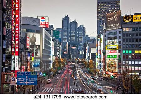 Stock Photograph - Tokyo City, Shinjuku District, Koshukaido Avenue.. Fotosearch