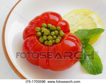 Tomato stuffed with peas, lemon and Mint, View Large Photo Image Stock Photograph - Tomato stuffed with peas, lemon and Mint,. Fotosearch