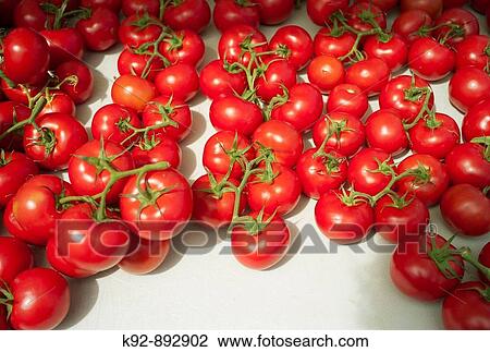 Stock Image - Tomatoes at a farmer's market. Fotosearch