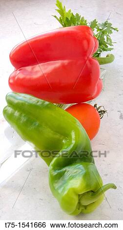 Tomatoes peppers and parsley View Large Photo Image Stock Photograph - Tomatoes peppers and parsley. Fotosearch