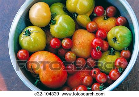 Tomatoes: red carmelo, green zebra and cherry View Large Photo Image Stock Photo - Tomatoes: red carmelo, green zebra and cherry. Fotosearch