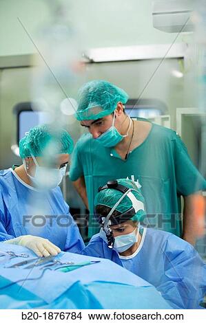 Tonsillectomy, Surgeons performing a tonsillectomy tonsil removal surgery, ORL, Otolaryngology Operating Room, Hospital Donostia, San Sebastian, Gipuzkoa, Basque Country, Spain View Large Photo Image Picture - Tonsillectomy, Surgeons performing a tonsillectomy tonsil removal surgery, ORL, Otolaryngology Operating Room, Hospital Donostia, San Sebastian, Gipuzkoa, Basque Country, Spain. Fotosearch
