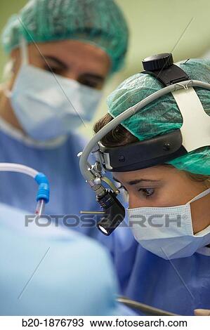 Tonsillectomy, Surgeons performing a tonsillectomy tonsil removal surgery, ORL, Otolaryngology Operating Room, Hospital Donostia, San Sebastian, Gipuzkoa, Basque Country, Spain View Large Photo Image Stock Image - Tonsillectomy, Surgeons performing a tonsillectomy tonsil removal surgery, ORL, Otolaryngology Operating Room, Hospital Donostia, San Sebastian, Gipuzkoa, Basque Country, Spain. Fotosearch