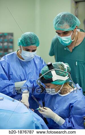 Tonsillectomy, Surgeons performing a tonsillectomy tonsil removal surgery, ORL, Otolaryngology Operating Room, Hospital Donostia, San Sebastian, Gipuzkoa, Basque Country, Spain View Large Photo Image Stock Photo - Tonsillectomy, Surgeons performing a tonsillectomy tonsil removal surgery, ORL, Otolaryngology Operating Room, Hospital Donostia, San Sebastian, Gipuzkoa, Basque Country, Spain. Fotosearch
