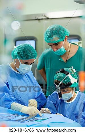Tonsillectomy, Surgeons performing a tonsillectomy tonsil removal surgery, ORL, Otolaryngology Operating Room, Hospital Donostia, San Sebastian, Gipuzkoa, Basque Country, Spain View Large Photo Image Stock Photograph - Tonsillectomy, Surgeons performing a tonsillectomy tonsil removal surgery, ORL, Otolaryngology Operating Room, Hospital Donostia, San Sebastian, Gipuzkoa, Basque Country, Spain. Fotosearch