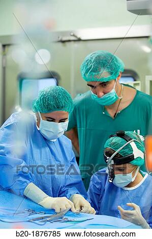 Tonsillectomy, Surgeons performing a tonsillectomy tonsil removal surgery, ORL, Otolaryngology Operating Room, Hospital Donostia, San Sebastian, Gipuzkoa, Basque Country, Spain View Large Photo Image Stock Photography - Tonsillectomy, Surgeons performing a tonsillectomy tonsil removal surgery, ORL, Otolaryngology Operating Room, Hospital Donostia, San Sebastian, Gipuzkoa, Basque Country, Spain. Fotosearch