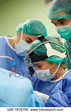 Tonsillectomy, Surgeons performing a tonsillectomy tonsil removal surgery, ORL, Otolaryngology Operating Room, Hospital Donostia, San Sebastian, Gipuzkoa, Basque Country, Spain View Large Photo Image Stock Photography - Tonsillectomy, Surgeons performing a tonsillectomy tonsil removal surgery, ORL, Otolaryngology Operating Room, Hospital Donostia, San Sebastian, Gipuzkoa, Basque Country, Spain. Fotosearch