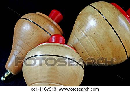 Stock Image - tops wooden, toys. Fotosearch