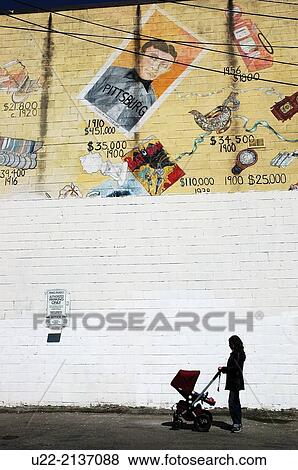 Toronto Canada: mother with stroller by some graffiti View Large Photo Image Stock Photo - Toronto Canada: mother with stroller by some graffiti. Fotosearch