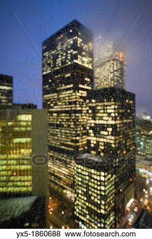 Toronto-Dominion Centre in Toronto Downtown banking district seen through rain drops on the window at night View Large Photo Image Stock Photo - Toronto-Dominion Centre in Toronto Downtown banking district seen through rain drops on the window at night. Fotosearch
