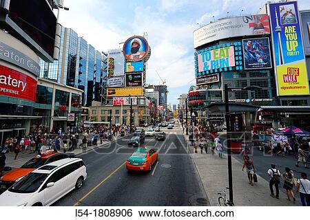 Stock Photograph - Toronto Ontario Canada Yonge Dundas Square shopping district downtown toronto busiest in the city. Fotosearch