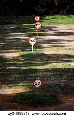 Stock Photo - Torremolinos, Malaga Province, Costa del Sol, Spain Markers on the driving range at the Parador Golf Course. Fotosearch