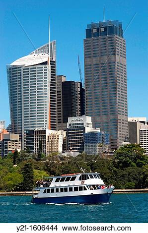 tour boat in Farm Cove, Sydney, with Macquarie Street high rise buildings View Large Photo Image Picture - tour boat in Farm Cove, Sydney, with Macquarie Street high rise buildings. Fotosearch