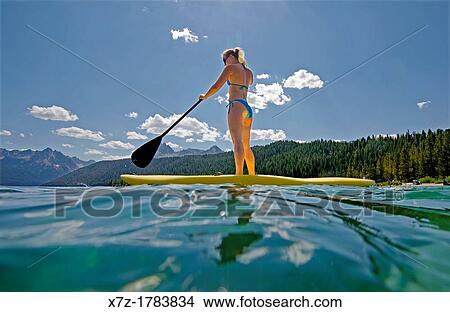 touring on the Stand Up Paddle Board at Redfish Lake in the Sawtooth Mountains near the town of Stanely in central Idaho View Large Photo Image Picture - touring on the Stand Up Paddle Board at Redfish Lake in the Sawtooth Mountains near the town of Stanely in central Idaho. Fotosearch