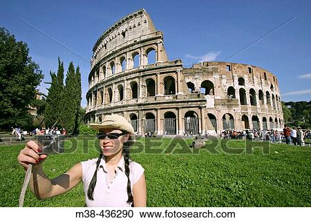 Tourist at the Coliseum. Rome, Italy View Large Photo Image Stock Image - Tourist at the Coliseum. Rome, Italy. Fotosearch
