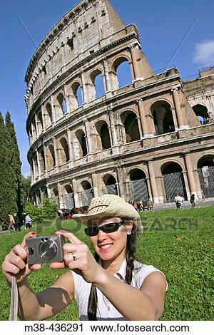 Stock Image - Tourist at the Coliseum. Rome, Italy. Fotosearch