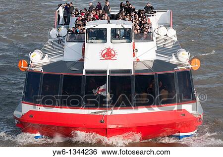 Tourist Boat Cruise along London's River Thames View Large Photo Image Stock Photograph - Tourist Boat Cruise along London's River Thames. Fotosearch