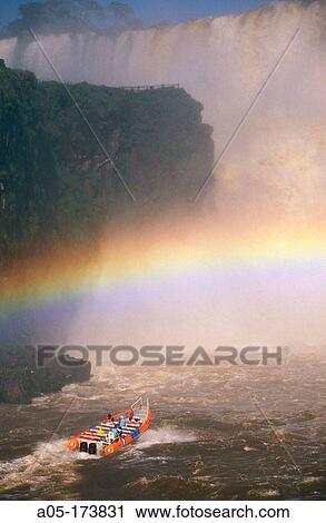 Stock Image - Tourist boat. San Mart? n waterfall. Iguaz waterfalls. Iguaz National Park. Argentina.. Fotosearch