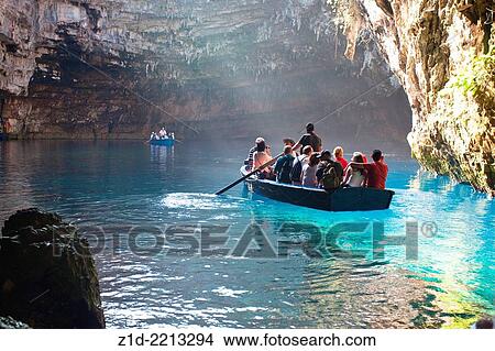 Tourist boats in Melissani Cave near Sami Cephalonia Ionian Islands Greece. View Large Photo Image Picture - Tourist boats in Melissani Cave near Sami Cephalonia Ionian Islands Greece.. Fotosearch