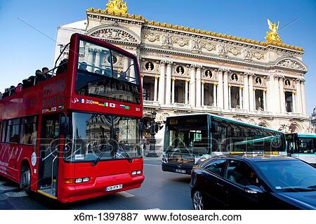 Tourist bus and The Opera Building Palais Garnier Paris, France, Europe View Large Photo Image Stock Photo - Tourist bus and The Opera Building Palais Garnier Paris, France, Europe. Fotosearch