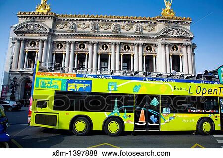 Tourist bus and The Opera Building Palais Garnier Paris, France, Europe View Large Photo Image Stock Photo - Tourist bus and The Opera Building Palais Garnier Paris, France, Europe. Fotosearch