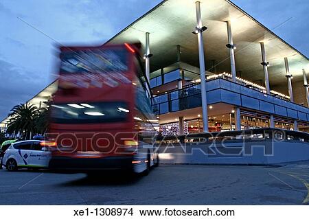 Picture - Tourist Bus in front of the Maremagnum shopping center, Barcelona, Catalonia, Spain.. Fotosearch