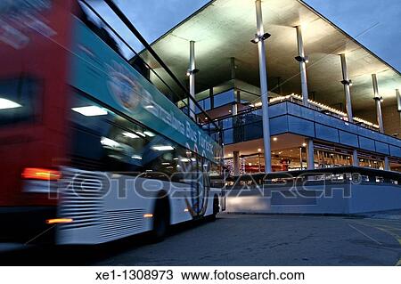 Tourist Bus in front of the Maremagnum shopping center, Barcelona, Catalonia, Spain. View Large Photo Image Stock Image - Tourist Bus in front of the Maremagnum shopping center, Barcelona, Catalonia, Spain.. Fotosearch
