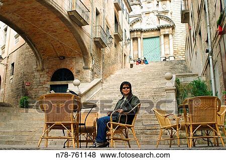 Stock Photo - Tourist in the Jewish quarter, Girona. Catalonia, Spain. Fotosearch