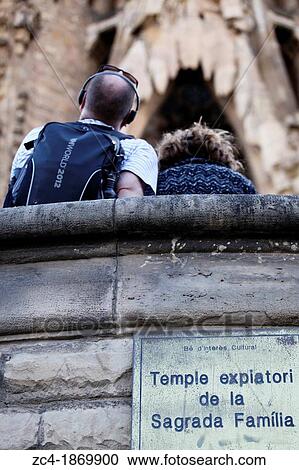 Tourist looking up La Sagrada Familia, Spain View Large Photo Image Stock Image - Tourist looking up La Sagrada Familia, Spain. Fotosearch