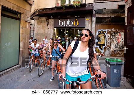 Tourist on bikes, Born district, Ciutat Vella (Old Town), Barcelona, Spain View Large Photo Image Stock Photo - Tourist on bikes, Born district, Ciutat Vella (Old Town), Barcelona, Spain. Fotosearch