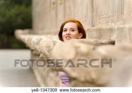 Stock Photo - Tourist posing with monument in The Forbidden City, Beijing, China, Asia MR. Fotosearch