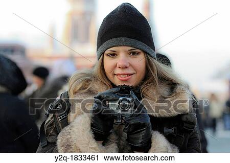 Tourist taking pictures in a winter day at Red Square, Moscow, Russia View Large Photo Image Stock Image - Tourist taking pictures in a winter day at Red Square, Moscow, Russia. Fotosearch