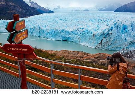 Tourist taking pictures. Perito Moreno glacier. Los Glaciares National Park. Near EL Calafate. Santa Cruz province. Patagonia. Argentina. View Large Photo Image Stock Image - Tourist taking pictures. Perito Moreno glacier. Los Glaciares National Park. Near EL Calafate. Santa Cruz province. Patagonia. Argentina.. Fotosearch