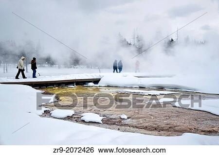 Tourists at Fountain Paint Pot in winter, Yellowstone National Park, UNESCO World Heritage Site, Wyoming, USA, North America. View Large Photo Image Stock Photograph - Tourists at Fountain Paint Pot in winter, Yellowstone National Park, UNESCO World Heritage Site, Wyoming, USA, North America.. Fotosearch