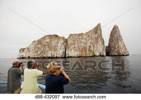 Tourists at Galapagos Islands. Ecuador View Large Photo Image Stock Photo - Tourists at Galapagos Islands. Ecuador. Fotosearch
