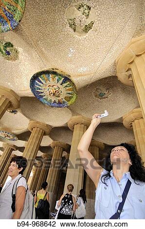 Tourists at Park G? ell by Antoni Gaudi, Barcelona, Catalonia, Spain View Large Photo Image Stock Image - Tourists at Park G? ell by Antoni Gaudi, Barcelona, Catalonia, Spain. Fotosearch