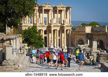 Stock Photo - Tourists in Curetes Way Ruins of Ephesus Izmir province Anatolia, Turkey. Fotosearch